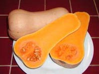 Picture of fresh sliced butternut squash on plate.