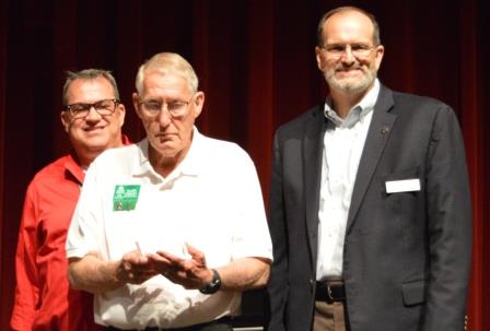 Allen Lindley receiving MG Rookie of the Year award from Randy Forst and Dr. Bob Scott