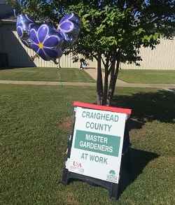Sign that reads Craighead County Master Gardeners at work