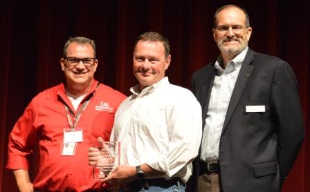 Kevin Vandiver receiving Friend of Master Gardener award from Randy Forst and Dr. Bob Scott